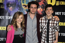 HOLLYWOOD - APRIL 12: Chloe Moretz, Christopher Mintz-Plasse and Aaron Johnson pose for a picture at the 'Kick Ass' cast meet and greet fan event held at Hot Topic on April 12, 2010 in Hollywood, California. (Photo by Toby Canham/Getty Images) *** Local Caption *** Chloe Moretz;Christopher Mintz-Plasse;Aaronn Johnson