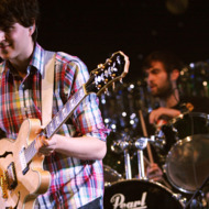 LOS ANGELES, CA - DECEMBER 13: Ezra Koenig of Vampire Weekend on night two of 106.7 KROQ FM's Almost Acoustic Christmas 2009 at the Gibson Amphitheatre at Universal CityWalk on December 13, 2009 in Los Angeles, California. (Photo by Karl Walter/Getty Images) LOS ANGELES, CA - DECEMBER 13: Ezra Koenig of Vampire Weekend on night two of 106.7 KROQ FM's Almost Acoustic Christmas 2009 at the Gibson Amphitheatre at Universal CityWalk on December 13, 2009 in Los Angeles, California. (Photo by Karl Walter/Getty Images)