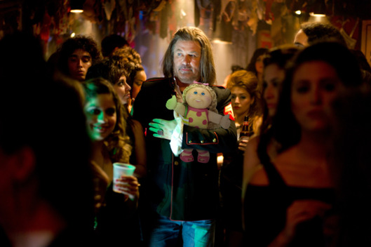 ALEC BALDWIN as Dennis Dupree in New Line Cinema’s rock musical “ROCK OF AGES,”