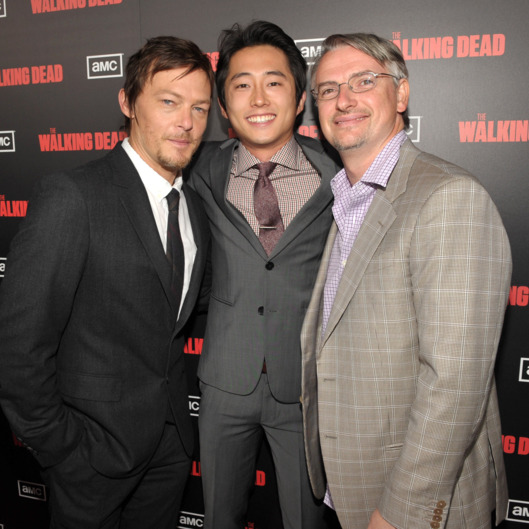 Norman Reedus, Steven Yeun, and Glen Mazzara attend the premiere of AMC's "The Walking Dead" Season 2 at Regal Cinemas L.A. Live on October 3, 2011 in Los Angeles, California.