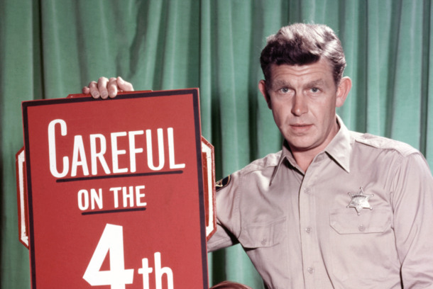 Andy Griffith, US actor, and Ron Howard, US actor, pose beside a large firework, with a sign reading 'Careful on the 4th' in a publicity portrait issued for the US television series, 'The Andy Griffith Show', USA, circa 1963. The sitcom starred (Photo by Silver Screen Collection/Getty Images) Andy Griffith, US actor, and Ron Howard, US actor, pose beside a large firework, with a sign reading 'Careful on the 4th' in a publicity portrait issued for the US television series, 'The Andy Griffith Show', USA, circa 1963. The sitcom starred (Photo by Silver Screen Collection/Getty Images)