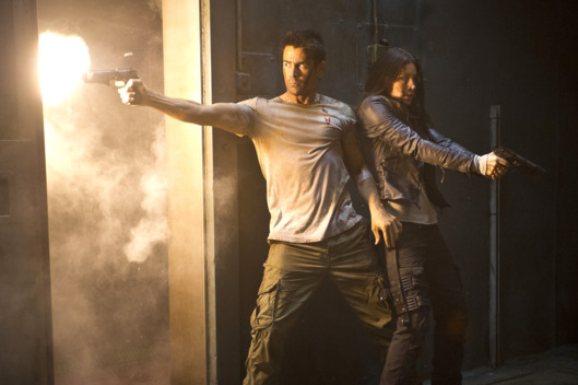 Colin Farrell (left) and Jessica Biel star in Columbia Pictures' action thriller TOTAL RECALL.