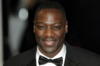 British actor Adewale Akinnuoye-Agbaje poses on the red carpet arriving at the BAFTA British Academy Film Awards at the Royal Opera House in London on February 12, 2012. British actor Adewale Akinnuoye-Agbaje poses on the red carpet arriving at the BAFTA British Academy Film Awards at the Royal Opera House in London on February 12, 2012.