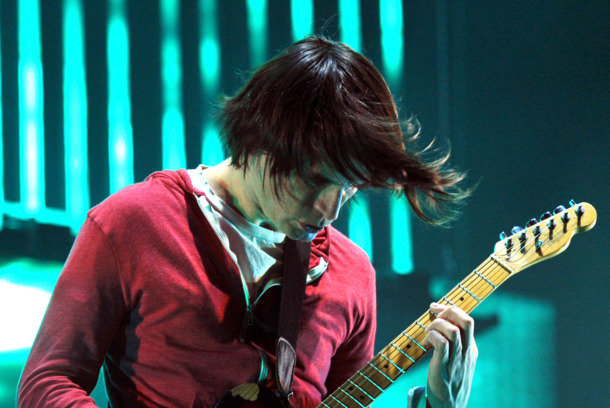 INDIO, CA - APRIL 14: Musician Jonny Greenwood of Radiohead performs onstage during day 2 of the 2012 Coachella Valley Music & Arts Festival at the Empire Polo Field on April 14, 2012 in Indio, California. (Photo by Kevin Winter/Getty Images for Coachella) INDIO, CA - APRIL 14: Musician Jonny Greenwood of Radiohead performs onstage during day 2 of the 2012 Coachella Valley Music & Arts Festival at the Empire Polo Field on April 14, 2012 in Indio, California. (Photo by Kevin Winter/Getty Images for Coachella)