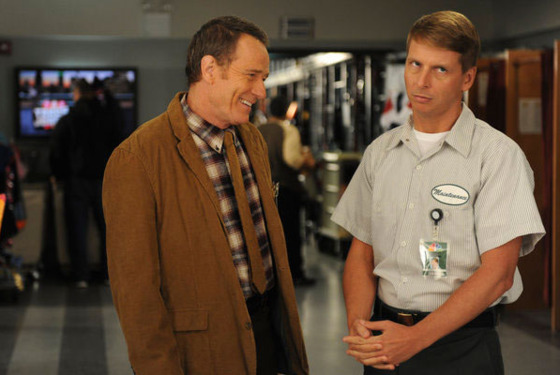 30 ROCK -- "Governor Dunston" Episode 702 -- Pictured: (l-r) Brian Cranston as Ron, Jack McBrayer as Kenneth Parcell. 30 ROCK -- "Governor Dunston" Episode 702 -- Pictured: (l-r) Brian Cranston as Ron, Jack McBrayer as Kenneth Parcell.