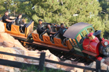 Players from the University of Oregon Ducks celebrating the 98th Rose Bowl Game ride Big thunder Mountain Railroad at Disneyland park on December 27, 2011 in Anaheim, California.
