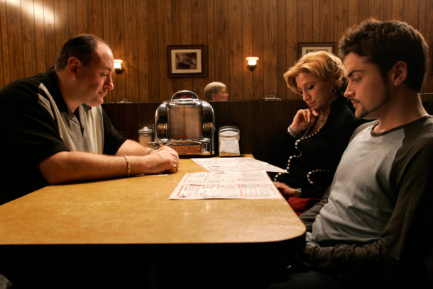 The Sopranos "Made In America" - "The gang shows up for family dinner" - James Gandolfini (Tony Soprano) - Edie Falco (Carmela) - Robert Iler (Anthony Jr.) The Sopranos "Made In America" - "The gang shows up for family dinner" - James Gandolfini (Tony Soprano) - Edie Falco (Carmela) - Robert Iler (Anthony Jr.)