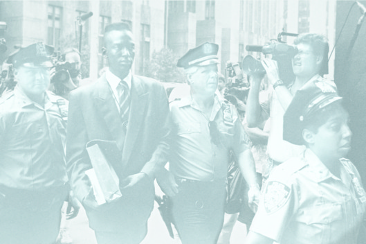 UNITED STATES - AUGUST 18: Accused rapist Yusef Salaam is escorted by police. (Photo by Clarence Davis/NY Daily News Archive via Getty Images)