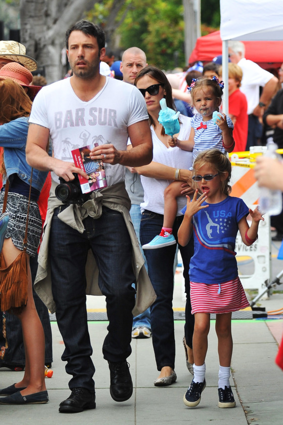 Ben Affleck and Jennifer Garner take their girls to a 4th of July parade. Ben Affleck and Jennifer Garner take their girls to a 4th of July parade.