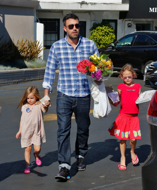 While Jennifer Garner visits the nail salon, Ben Affleck takes Violet and Seraphina to the market in Brentwood, CA.