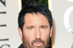 Composer Trent Reznor arrives at the 69th Annual Golden Globe Awards held at the Beverly Hilton Hotel on January 15, 2012 in Beverly Hills, California.