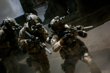 In the darkest hour of the night, elite Navy SEALs raid Osama Bin Laden's compound in Columbia Pictures' ultra realistic new thriller from director Kathryn Bigelow, about the greatest manhunt in history, ZERO DARK THIRTY.