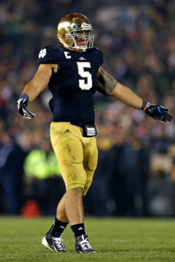 Manti T'eo #5 of the Notre Dame Fighting Irish encourages the crowd to cheer during a game against the Wake Forest Demon Deacons at Notre Dame Stadium on November 17, 2012 in South Bend, Indiana. Notre Dame defeated Wake Forest 38-0. Manti T'eo #5 of the Notre Dame Fighting Irish encourages the crowd to cheer during a game against the Wake Forest Demon Deacons at Notre Dame Stadium on November 17, 2012 in South Bend, Indiana. Notre Dame defeated Wake Forest 38-0.