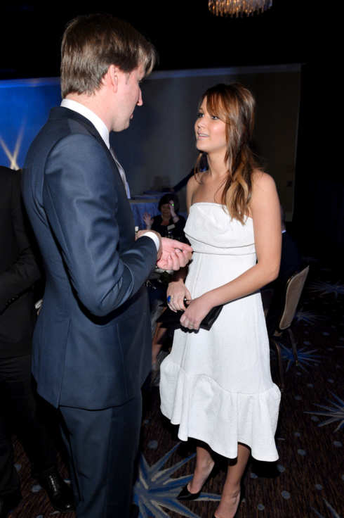 Actress Jennifer Lawrence (R) and Director Tom Hooper attend the 85th Academy Awards Nominations Luncheon at The Beverly Hilton Hotel on February 4, 2013 in Beverly Hills, California.