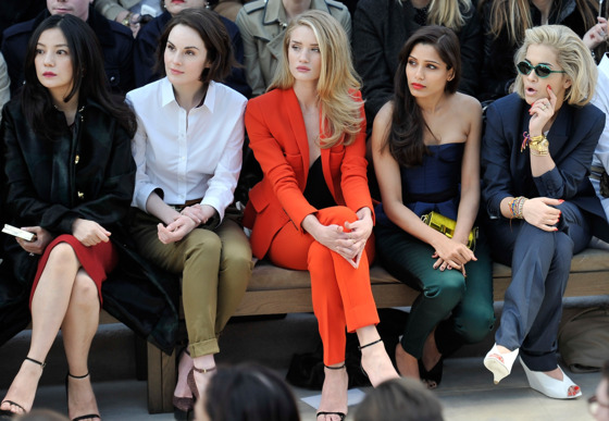 LONDON, ENGLAND - FEBRUARY 18: (L-R) Vicki Zhao, Michelle Dockery, Rosie Huntington-Whiteley, Freida Pinto and Rita Ora sit in the front row for the Burberry Prorsum Autumn Winter 2013 Womenswear show on February 18, 2013 in London, England. (Photo by Gareth Cattermole/Getty Images for Burberry) LONDON, ENGLAND - FEBRUARY 18: (L-R) Vicki Zhao, Michelle Dockery, Rosie Huntington-Whiteley, Freida Pinto and Rita Ora sit in the front row for the Burberry Prorsum Autumn Winter 2013 Womenswear show on February 18, 2013 in London, England. (Photo by Gareth Cattermole/Getty Images for Burberry)