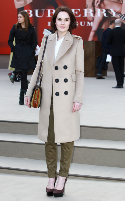 LONDON, UNITED KINGDOM - FEBRUARY 18: Michelle Dockery attends the Burberry Prorsum show during London Fashion Week Fall/Winter 2013/14 at on February 18, 2013 in London, England. (Photo by Fred Duval/Getty Images)