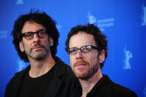 (from L) US film-making brothers Joel Coen and Ethan Coen pose for photographers during a photocall for their movie "True Grit" in Berlin on February 10, 2011 on the first day of the international Berlinale film festival. "True Grit", an Oscar-nominated remake of the classic western, kicks off the 61st Berlin film festival, a 10-day extravaganza of glitzy entertainment and explosive political fare. The Berlinale takes place from February 10 to 20, 2010. AFP PHOTO / JOHANNES EISELE (Photo credit should read JOHANNES EISELE/AFP/Getty Images) (from L) US film-making brothers Joel Coen and Ethan Coen pose for photographers during a photocall for their movie "True Grit" in Berlin on February 10, 2011 on the first day of the international Berlinale film festival. "True Grit", an Oscar-nominated remake of the classic western, kicks off the 61st Berlin film festival, a 10-day extravaganza of glitzy entertainment and explosive political fare. The Berlinale takes place from February 10 to 20, 2010. AFP PHOTO / JOHANNES EISELE (Photo credit should read JOHANNES EISELE/AFP/Getty Images)