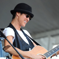 Michelle Shocked performs during the 2011 New Orleans Jazz & Heritage Festival - Day 4 presented by Shell at The Fair Grounds Race Course on May 5, 2011 in New Orleans, Louisiana. Michelle Shocked performs during the 2011 New Orleans Jazz & Heritage Festival - Day 4 presented by Shell at The Fair Grounds Race Course on May 5, 2011 in New Orleans, Louisiana.