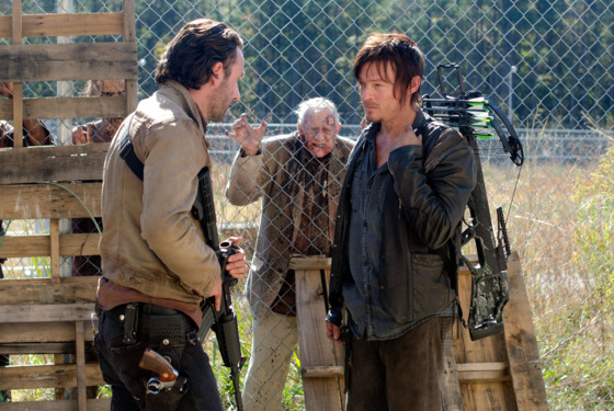 Rick Grimes (Andrew Lincoln), Daryl Dixon (Norman Reedus) and Walkers - The Walking Dead - Season 3, Episode 15 Rick Grimes (Andrew Lincoln), Daryl Dixon (Norman Reedus) and Walkers - The Walking Dead - Season 3, Episode 15