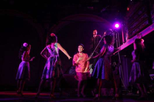 Ruthie Ann Miles (center) and the cast of Here Lies Love, with concept and lyrics by David Byrne, music by David Byrne and Fatboy Slim, additional music by Tom Gandey and J Pardo, choreographed by Anne-B Parson, and directed by Alex Timbers, running at The Public Theater at Astor Place. Photo credit: Joan Marcus