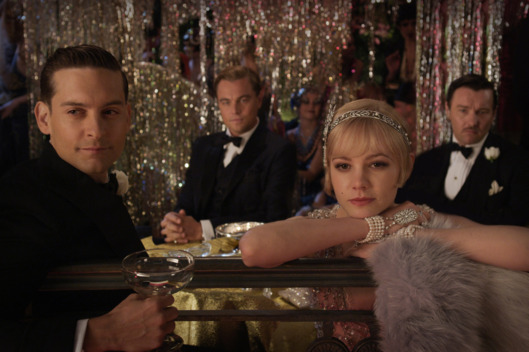 (L-r) TOBEY MAGUIRE as Nick Carraway, LEONARDO DICAPRIO as Jay Gatsby, CAREY MULLIGAN as Daisy Buchanan and JOEL EDGERTON as Tom Buchanan in Warner Bros. Pictures’ and Village Roadshow Pictures’ drama “THE GREAT GATSBY,” a Warner Bros. Pictures release.