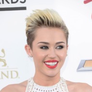 Singer Miley Cyrus arrives at the 2013 Billboard Music Awards at the MGM Grand Garden Arena on May 19, 2013 in Las Vegas, Nevada. Singer Miley Cyrus arrives at the 2013 Billboard Music Awards at the MGM Grand Garden Arena on May 19, 2013 in Las Vegas, Nevada.
