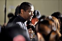 Actor Denzel Washington is interviewed by the media at the 'Flight' Japan Premiere at Marunouchi Piccadilly on February 21, 2013 in Tokyo, Japan. The film will open on March 1 in Japan.