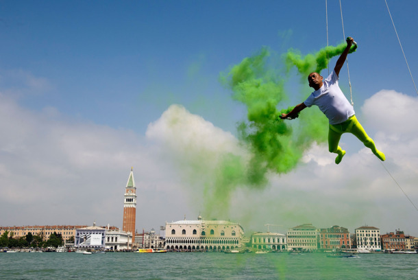 Chinese artist Li Wei performs in front of Saint's Mark as part of the 55th International Art Exhibition on May 28, 2013 in Venice, Italy. The 55th International Art Exhibition of La Biennale di Venezia will be open to the public from the June 1 - November 24, 2013. Chinese artist Li Wei performs in front of Saint's Mark as part of the 55th International Art Exhibition on May 28, 2013 in Venice, Italy. The 55th International Art Exhibition of La Biennale di Venezia will be open to the public from the June 1 - November 24, 2013.