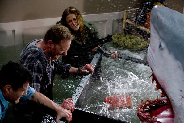 SHARKNADO -- "Syfy Original Movie" -- Pictured: (l-r) Ian Ziering as Fin, Cassie Scerbo as Nova -- (Photo by: Syfy) SHARKNADO -- "Syfy Original Movie" -- Pictured: (l-r) Ian Ziering as Fin, Cassie Scerbo as Nova -- (Photo by: Syfy)