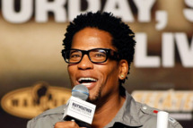LAS VEGAS - SEPTEMBER 18: Actor/comedian D.L. Hughley speaks at the official weigh-in for boxers Floyd Mayweather Jr. and Juan Manuel Marquez at the MGM Grand Garden Arena September 18, 2009 in Las Vegas, Nevada. The two will fight at the MGM on September 19. (Photo by Ethan Miller/Getty Images) *** Local Caption *** D.L. Hughley