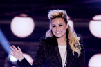 UNIVERSAL CITY, CA - AUGUST 11: Singer Demi Lovato accepts the Choice Female Artist award onstage at the Teen Choice Awards 2013 at the Gibson Amphitheatre on August 11, 2013 in Universal City, California. (Photo by Kevin Winter/Getty Images) UNIVERSAL CITY, CA - AUGUST 11: Singer Demi Lovato accepts the Choice Female Artist award onstage at the Teen Choice Awards 2013 at the Gibson Amphitheatre on August 11, 2013 in Universal City, California. (Photo by Kevin Winter/Getty Images)
