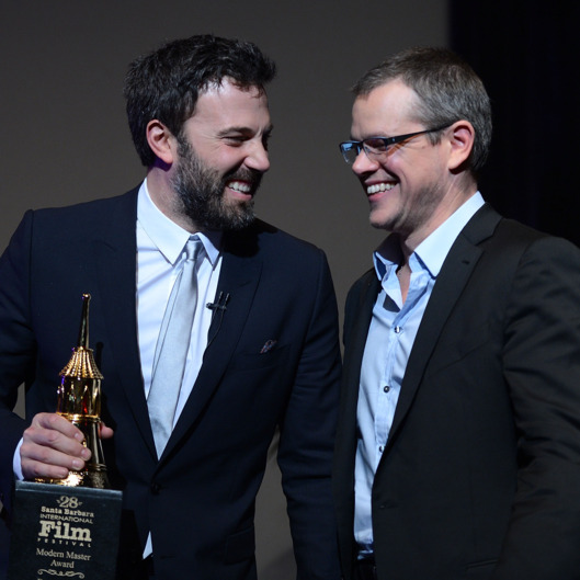 SANTA BARBARA, CA - JANUARY 25: Matt Damon (R) presents Ben Affleck with the Modern Master Award outside The Moet & Chandon Lounge at The Santa Barbara International Film Festival on January 25, 2013 in Santa Barbara, California. (Photo by Michael Kovac/WireImage)
