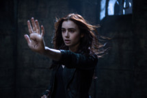 Clary Fray (Lily Collins) in MORTAL INSTRUMENTS: CITY OF BONES.