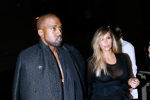 PARIS, FRANCE - SEPTEMBER 29: Kim Kardashian and Kanye West arriving at Givenchy show as part of the Paris Fashion Week Womenswear Spring/Summer 2014, held at 'la Halle Freyssinet' on September 29, 2013 in Paris, France. (Photo by Bertrand Rindoff Petroff/Getty Images)