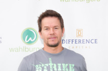 TORONTO, ON - SEPTEMBER 09: Mark Wahlberg arrives on the green carpet at the "Wahlburgers" premiere at Soho Metropolitan Hotel on September 9, 2013 in Toronto, Canada. (Photo by George Pimentel/WireImage)