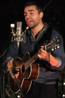 Actor Oscar Issac performs onstage during reception honoring Joel and Ethan Coen and T Bone Burnett to celebrate the music of "Inside Llewyn Davis" at Buffalo Club on November 13, 2013 in Santa Monica, California. Actor Oscar Issac performs onstage during reception honoring Joel and Ethan Coen and T Bone Burnett to celebrate the music of "Inside Llewyn Davis" at Buffalo Club on November 13, 2013 in Santa Monica, California.