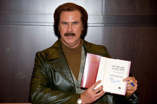 Anchorman Ron Burgundy signs copies of his new book "Let Me Off At The Top: My Classy Life And Other Musings" at Barnes & Noble bookstore at The Grove on November 20, 2013 in Los Angeles, California.
