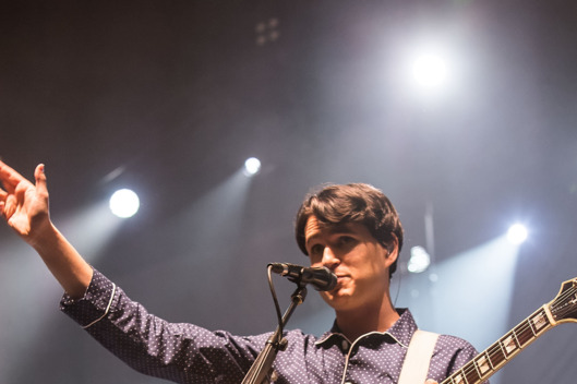 SEATTLE, WA - DECEMBER 03: Ezra Koenig of Vampire Weekend performs live at Key Arena on December 3, 2013 in Seattle, Washington. (Photo by Suzi Pratt/FilmMagic)