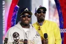 Actor/rappers Antwan A. (Big Boi) Patton (L) and Andre (Andre 3000) Benjamin of Outkast appear onstage during MTV's Total Request Live at the MTV Times Square Studios on August 22, 2006 in New York City.