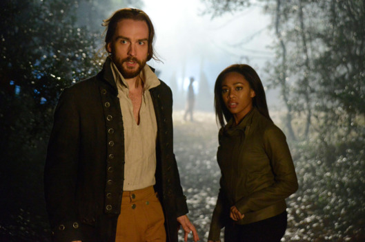 SLEEPY HOLLOW: Ichabod Crane (Tom Mison, L) and Lt. Abbie Mills (Nicole Beharie, R) search for clues in the "Bad Blood," part 2 of the special two-hour Season Finale episode of SLEEPY HOLLOW airing Monday, Jan. 20 (8:00-10:00 PM ET/PT) on FOX.