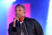 NEW ORLEANS, LA - FEBRUARY 16: Musician Pharrell Williams performs onstage at the 63rd NBA All-Star Game 2014 at the Smoothie King Center on February 16, 2014 in New Orleans, Louisiana. (Photo by Mike Coppola/Getty Images)