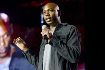 MOUNTAIN VIEW, CA - SEPTEMBER 20: Dave Chappelle performs as part of the The Oddball Comedy & Curiosity Festival at Shoreline Amphitheatre on September 20, 2013 in Mountain View, California. (Photo by Tim Mosenfelder/Getty Images)