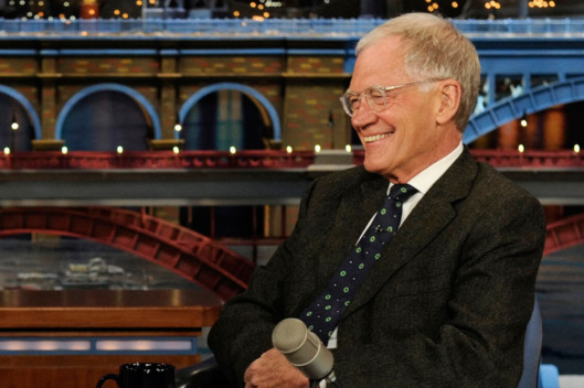 NEW YORK - MARCH 31: Actress Cobie Smulders from the CBS comedy series "How I Met Your Mother" talks to Dave about the series finale on the Late Show with David Letterman Monday March 31, 2014 on the CBS Television Network. (Photo by Jeffrey R. Staab/CBS via Getty Images) *** Local Caption *** David Letterman;Cobie Smulders