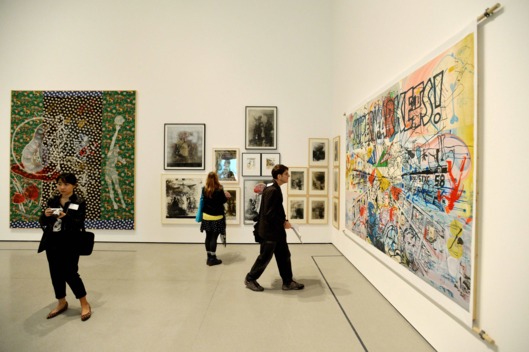 People look at artworks displayed at a major retrospective of German artist Sigmar Polke entitled 'Alibis: Sigmar Polke 1963–2010' during a preview of the show at the Museum of Modern Art in New York, New York, USA, 09 April 2014.