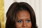 WASHINGTON, DC - APRIL 03: U.S. first lady Michelle Obama speaks during an event honoring the 2014 Olympic and Paralympic teams with Jon Lujan (R) and Julie Chi (C) at the White House April 3, 2014 in Washington, DC. Obama congratulated the Olympians and Paralympians on their performance and thanked them for representing the U.S. during the 2014 Olympic Winter Games in Sochi, Russia. (Photo by Win McNamee/Getty Images) WASHINGTON, DC - APRIL 03: U.S. first lady Michelle Obama speaks during an event honoring the 2014 Olympic and Paralympic teams with Jon Lujan (R) and Julie Chi (C) at the White House April 3, 2014 in Washington, DC. Obama congratulated the Olympians and Paralympians on their performance and thanked them for representing the U.S. during the 2014 Olympic Winter Games in Sochi, Russia. (Photo by Win McNamee/Getty Images)