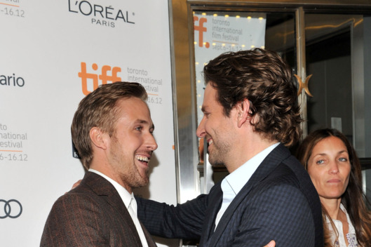 TORONTO, ON - SEPTEMBER 07: Actors (L-R) Ryan Gosling and Bradley Cooper attend "The Place Beyond The Pines" premiere during the 2012 Toronto International Film Festival at Princess of Wales Theatre on September 7, 2012 in Toronto, Canada. (Photo by Sonia Recchia/Getty Images)