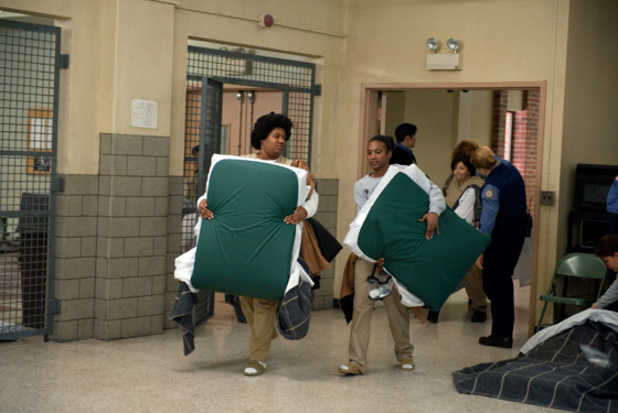 Adrienne C. Moore (L) and Vicky Jeudy (R) in a scene from Netflix’s “Orange is the New Black” Season 2. Photo credit: JoJo Whilden for Netflix. Adrienne C. Moore (L) and Vicky Jeudy (R) in a scene from Netflix’s “Orange is the New Black” Season 2. Photo credit: JoJo Whilden for Netflix.