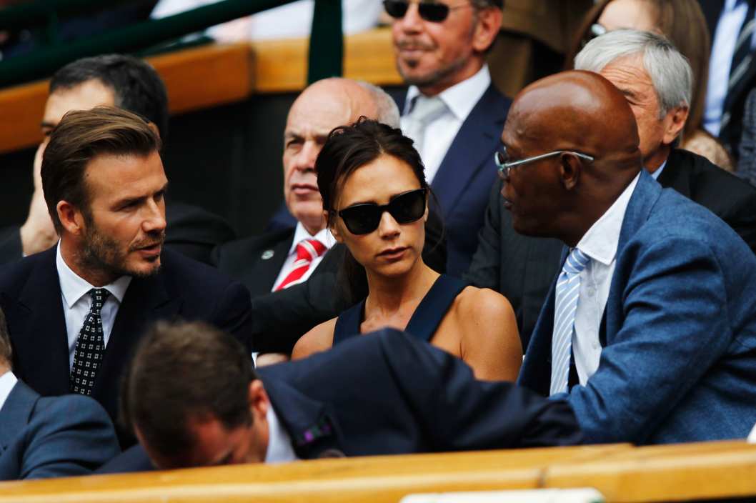 LONDON, ENGLAND - JULY 06: David Beckham, Victoria Beckham and Samuel L Jackson in the Royal Box on Centre Court before the Gentlemen's Singles Final match between Roger Federer of Switzerland and Novak Djokovic of Serbia on day thirteen of the Wimbledon Lawn Tennis Championships at the All England Lawn Tennis and Croquet Club on July 6, 2014 in London, England. (Photo by Pool/Getty Images)