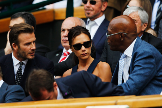 LONDON, ENGLAND - JULY 06: David Beckham, Victoria Beckham and Samuel L Jackson in the Royal Box on Centre Court before the Gentlemen's Singles Final match between Roger Federer of Switzerland and Novak Djokovic of Serbia on day thirteen of the Wimbledon Lawn Tennis Championships at the All England Lawn Tennis and Croquet Club on July 6, 2014 in London, England. (Photo by Pool/Getty Images)