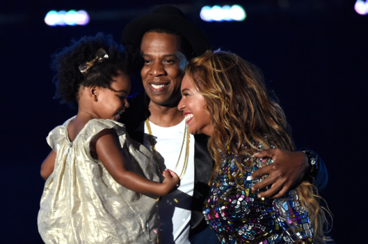 INGLEWOOD, CA - AUGUST 24: Blue Ivy Carter, Jay-Z and Beyonce onstage during the 2014 MTV Video Music Awards at The Forum on August 24, 2014 in Inglewood, California. (Photo by Kevin Mazur/MTV1415/WireImage)